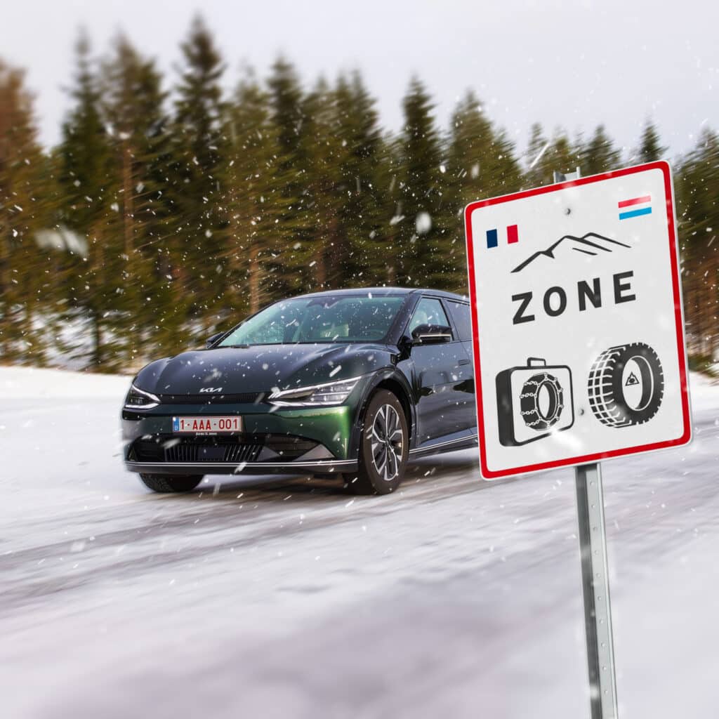 Kia équipée de pneus neige pour conformité routière en France et Luxembourg